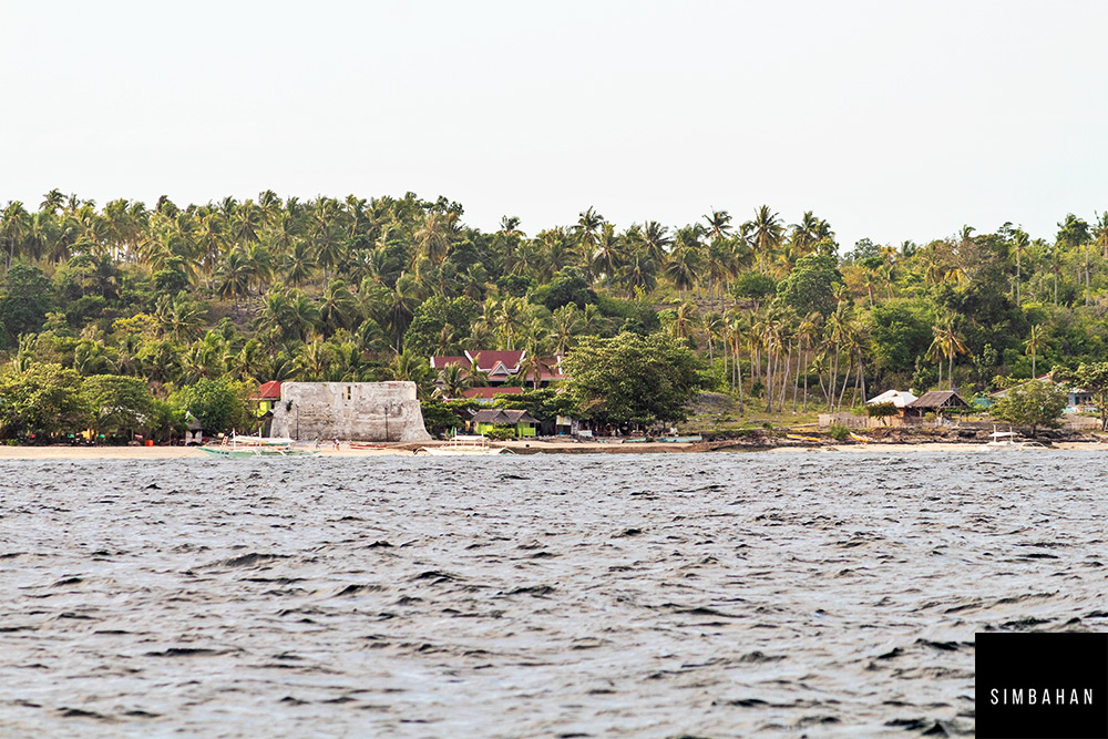 Pamilacan Fort viewed as the banca approaches the town